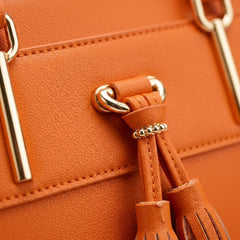 Rosvovo Tassel Hobo Handbag for Women, Elegant Vegan Leather Crossbody Bag with Adjustable Shoulder Strap, Orange