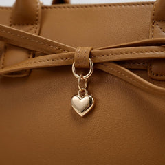 Rosvovo Brown Vegan Leather Handbag for Women, Crossbody Purse with Adjustable Shoulder Strap and Heart Charm Decoration