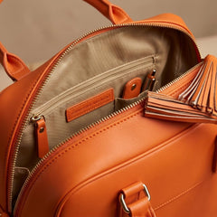 Rosvovo Tassel Hobo Handbag for Women, Elegant Vegan Leather Crossbody Bag with Adjustable Shoulder Strap, Orange