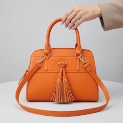 Rosvovo Tassel Hobo Handbag for Women, Elegant Vegan Leather Crossbody Bag with Adjustable Shoulder Strap, Orange